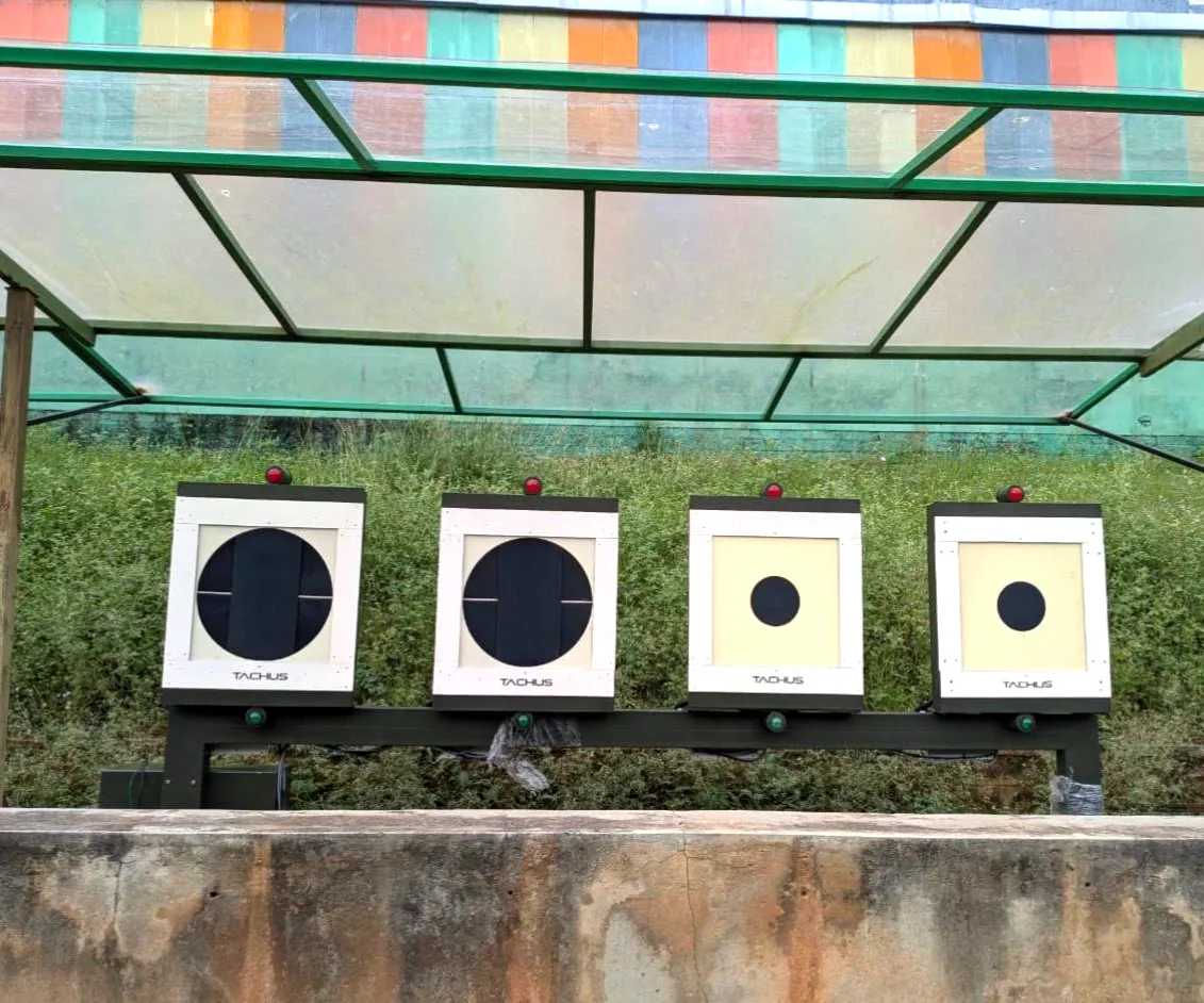 Four Tachus 25 Electronic Target System units installed at an outdoor shooting range