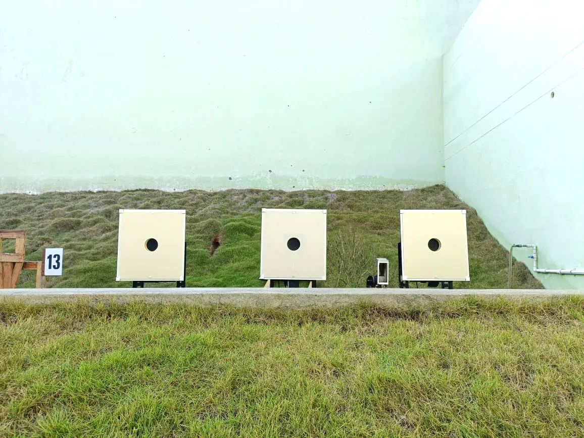 Three Tachus 50/10 Electronic Target System units installed at an outdoor shooting range